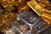 Gold silver prices drop on global markets