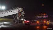 Two pilots killed as Air Canada Express jet collides with fire truck at LaGuardia 
