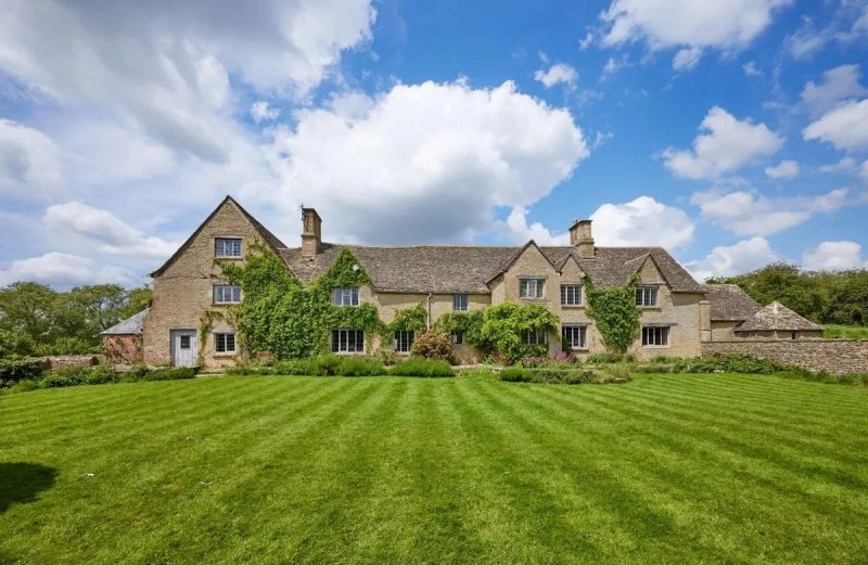 Cotswold manor on site of medieval castle for sale in Oxford