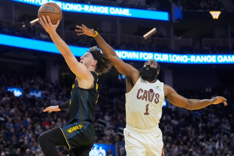 Mitchell, Strus lead Cavaliers past Warriors 118-111