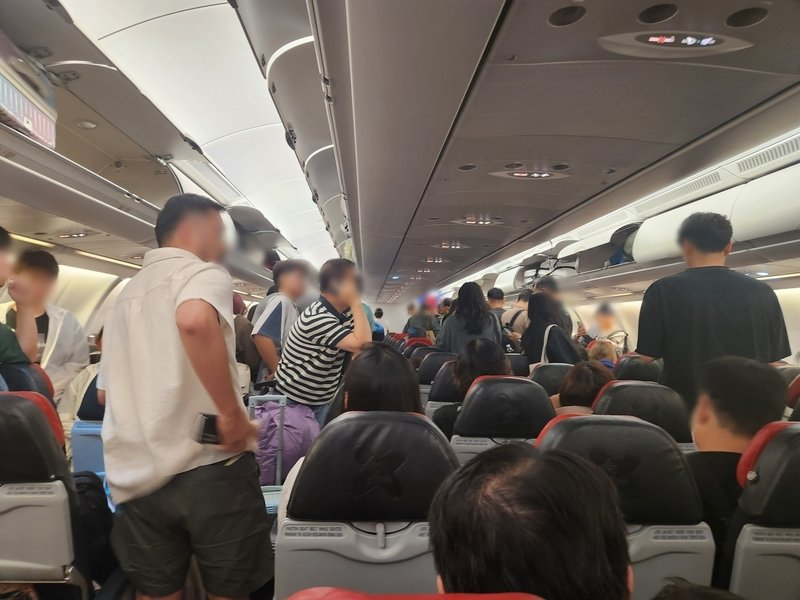 AirAsia flight horror: Cabin ceiling collapses during landing in Kuala Lumpur -  PHOTO 