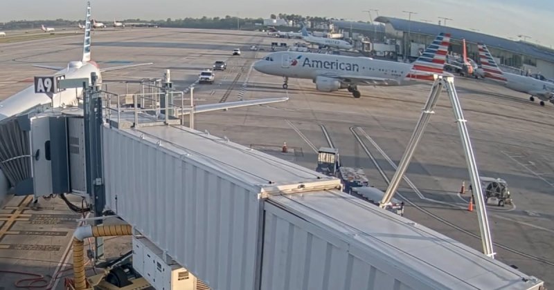 American Airlines plane brakes hard to avoid truck at Charlotte airport -  VIDEO 
