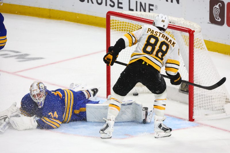 Bruins edge Sabres in OT to keep playoff hopes alive