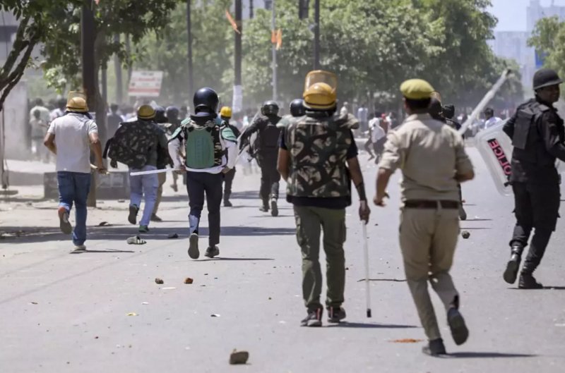 Noida workers’ wage protest turns violent; police deploy tear gas and arrest 50 
