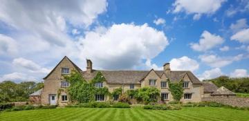 Cotswold manor on site of medieval castle for sale in Oxford