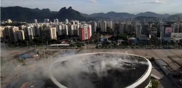 Flames damage the fabric roof of the Rio Olympic Park velodrome