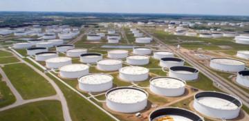 Oil fluctuates as US-Iran talks and Hormuz blockade weigh