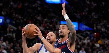 Warriors rally late to stun Clippers in play-in game