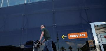 EasyJet hit by rising fuel costs, legal bills
