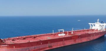 Oil tankers pass through the Strait of Hormuz safely