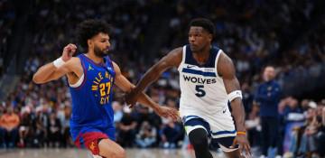 Wolves stun Nuggets late to tie playoff series