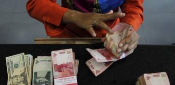 Indonesian rupiah crashes to record low against US dollar