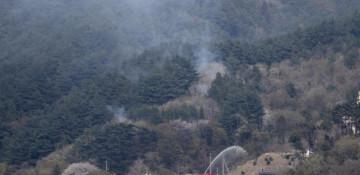 Hundreds of firefighters battle wildfires in northern Japan