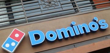 Domino’s sales miss as Americans cut dining spending