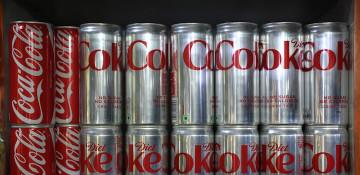 Coca-Cola raises profit forecast on strong demand
