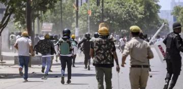 Noida workers’ wage protest turns violent; police deploy tear gas and arrest 50 