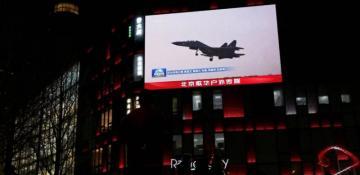 Beijing touts economic boom as Taiwan rejects 