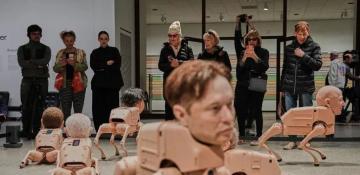 Robot dogs with Musk and Zuckerberg heads roam Berlin gallery in Beeple's new exhibit