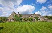 Cotswold manor on site of medieval castle for sale in Oxford