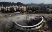 Flames damage the fabric roof of the Rio Olympic Park velodrome