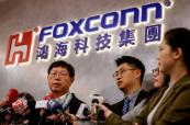 Foxconn revenue surges on AI boom, warns of risks 