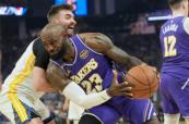 Lakers beat Warriors 119-103 as Curry sits out