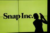 Snap to cut 1,000 jobs after investor pressure