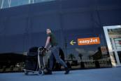 EasyJet hit by rising fuel costs, legal bills