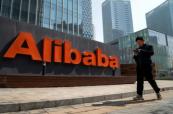 Alibaba shares edge higher in mixed market session