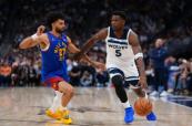 Wolves stun Nuggets late to tie playoff series