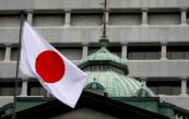Bank of Japan holds rates, raises inflation outlook
