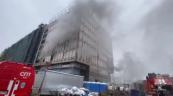 At least one dead as under-construction building catches fire in Moscow -  VIDEO 