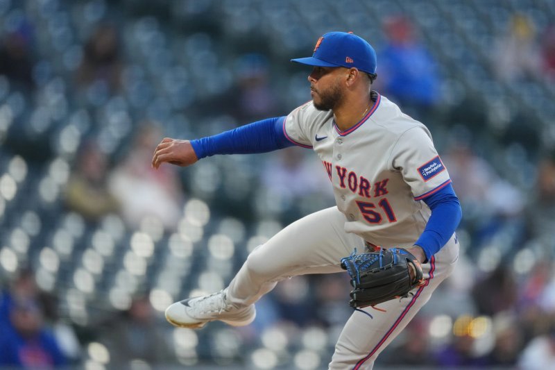 Mets dominate Rockies after six-hhour delay