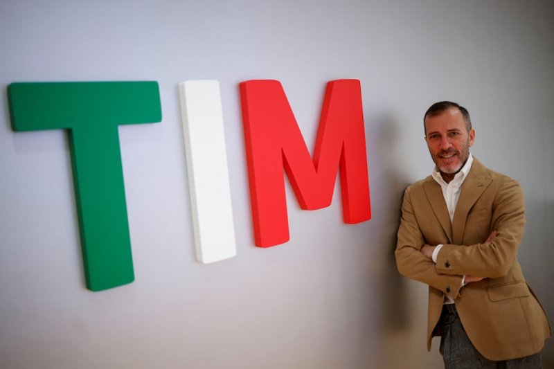 Telecom Italia CEO: too early to say if Poste bid needs raising 