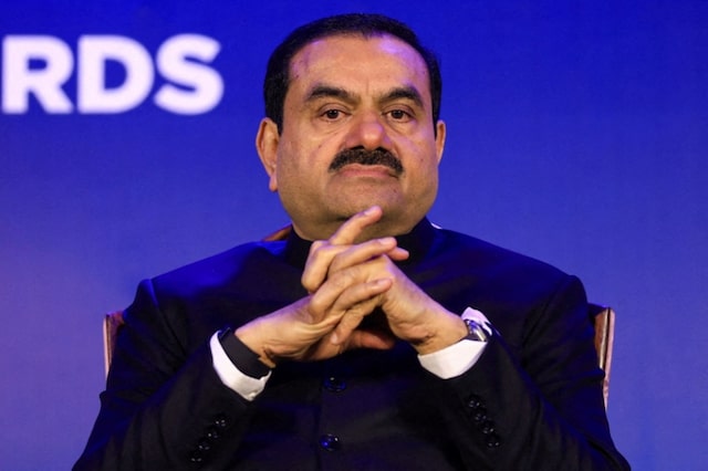 Why is the U.S. Justice Department considering dropping charges against Indian billionaire Gautam Adani?