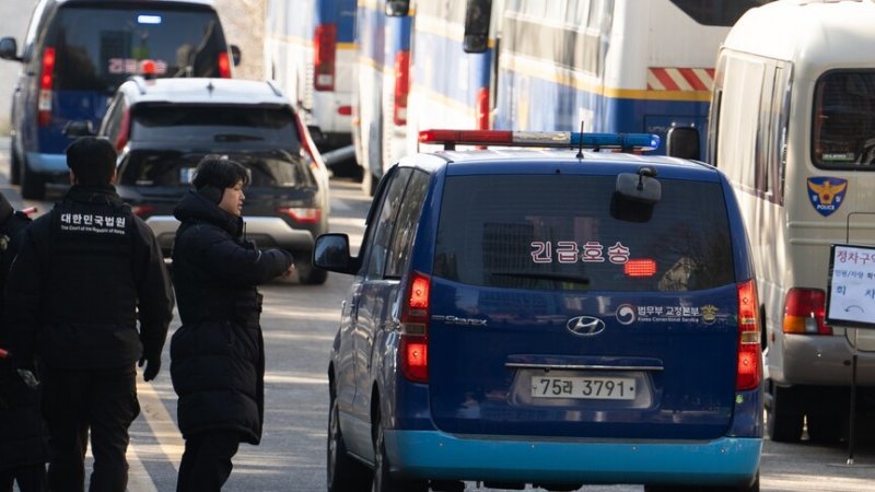 South Korean court sentences four for assaulting reporters