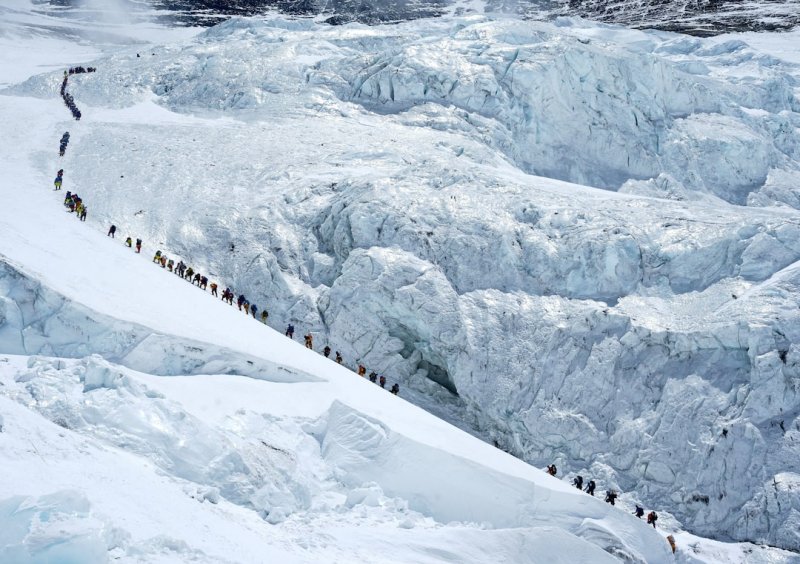 Record 274 climbers reach Mount Everest summit in single day