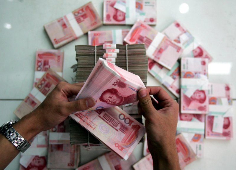 China’s yuan climbs to three-year high against US dollar