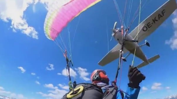 Miracle survival: Plane hits paraglider mid-air -  VIDEO 