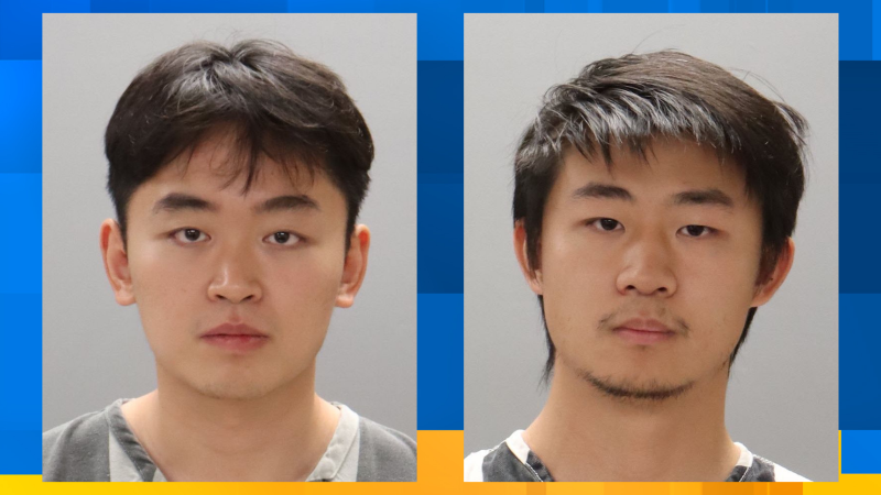 How did two men allegedly try to fraudulently purchase a Tesla at a Knoxville dealership?