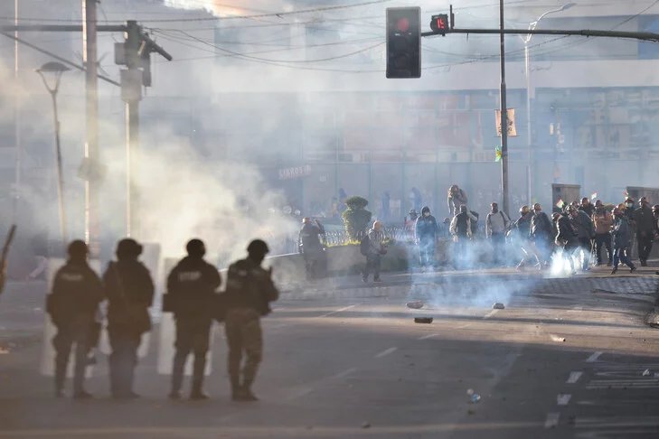 Bolivia miners clash with police as protests rock Paz government