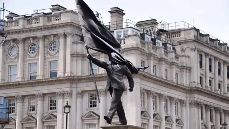 Banksy confirms blinded by the flag statue in central London is his work -  VIDEO 