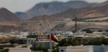 What happened in Oman and why was a residential building targeted?