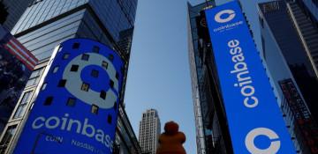 Coinbase shares advance despite layoff plan