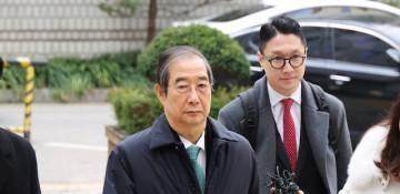 South Korea appeals court cuts jail sentence for ex-PM Han Duck-soo to 15 years 