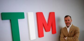 Telecom Italia CEO: too early to say if Poste bid needs raising 