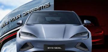 How does BYD’s strategy differ from traditional automakers? 
