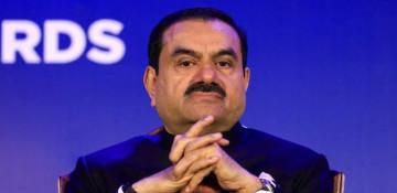 Why is the U.S. Justice Department considering dropping charges against Indian billionaire Gautam Adani?
