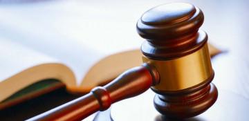 Why has a paediatrician in Germany been charged with 130 counts of sexual abuse?