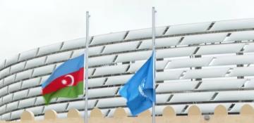 WUF13: Flags of the United Nations and the Republic of Azerbaijan raised